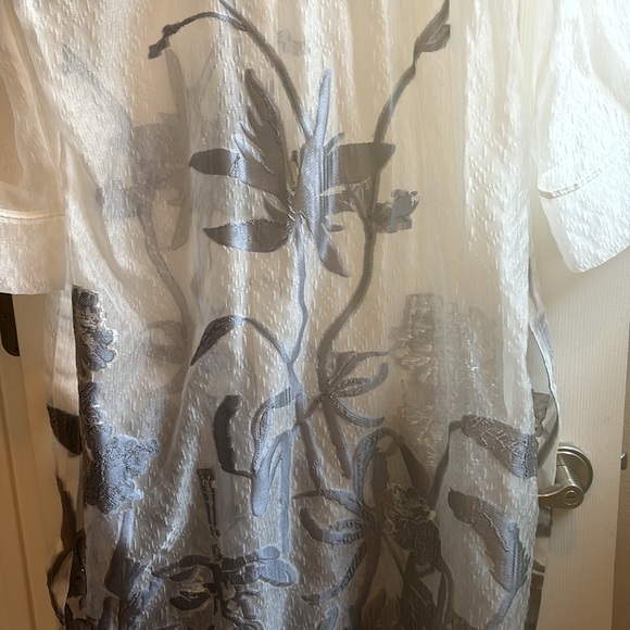 This is a beautiful gray duster. Never worn. Price 149.00 price tag still on - Picture 3 of 6